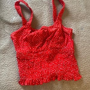 A cute flowered tank. Good stitching. Size XS.